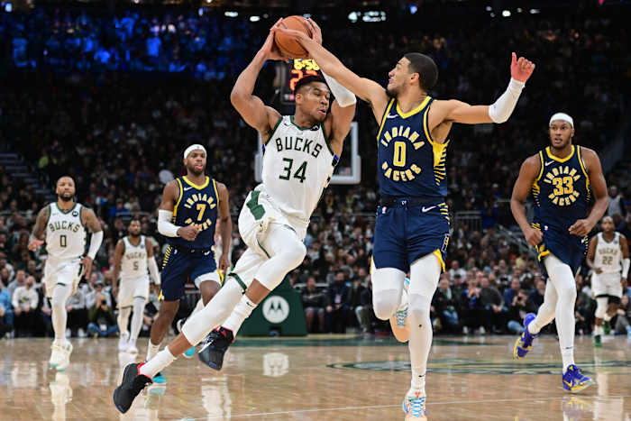 Milwaukee Bucks forward Giannis Antetokounmpo (34) drives for the basket against Indiana Pacers guard Tyrese Haliburton (0) i